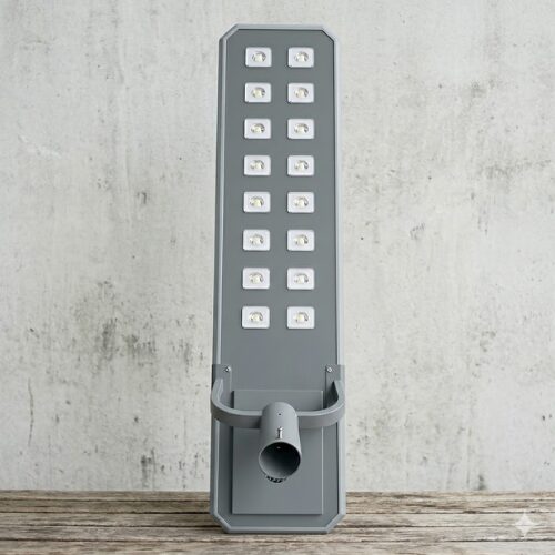 Untitled design (38) 150w Solar Street Lights 16eyes installed outdoors illuminating a residential compound at night