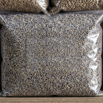 Bulk pack of high-purity lavender seeds (250g) packaged in a clear plastic bag for planting and agricultural supply in Nigeria