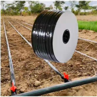 Complete Irrigation Combo Kit For One Acre – Drip Tape, End Cap, Connector with Valve, and Layflat Hose setup in field