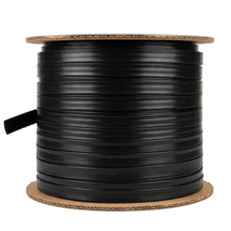 Roll of 16mm rubberized drip tape line wound on a cardboard spool for farm irrigation