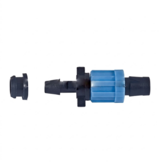 A single drip irrigation takeoff connector and rubber grommet set, isolated horizontally against a solid, seamless white background