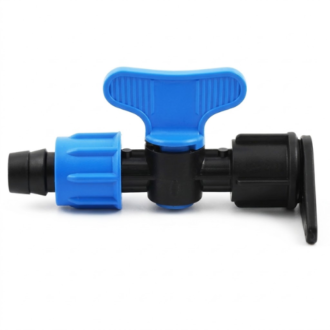 A drip irrigation layflat off-take valve connector with a bright blue butterfly control tap handle centered on a black polypropylene body, isolated horizontally on a pure white studio background. The fitting features a barbed outlet with a blue threaded locking nut on the left and a black layflat hose lock-washer connector on the right.