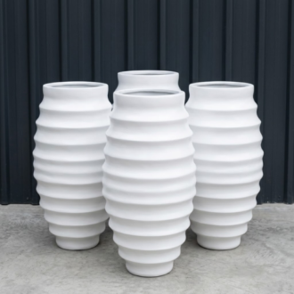 Modern ribbed white large flower pots for home decor and garden landscaping in Lagos